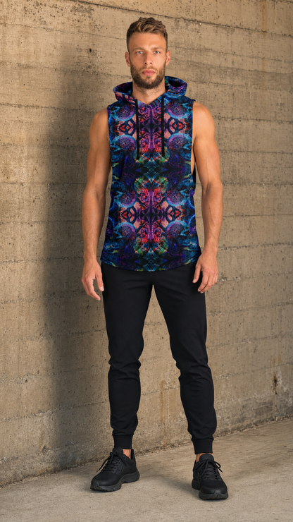 Male model wearing Dual Genesis sleeveless drop armhole hoodie against concrete wall